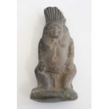 An Ancient Egyptian style burnished pottery figure, modelled as a zoomorphic lion God, New Kingdom