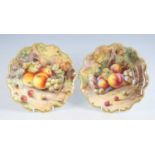 Two Worcester porcelain cabinet plates, decorated with fruit on a mossy bank by R Austin and