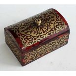 A 19th century 'Boulle' brass inlaid tortoiseshell match box, the domed hinged lid lifting to reveal