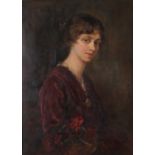 Mabel Bolton - Half-length portrait of a seated woman with flowers, oil on canvas, signed and