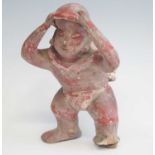 A hollow moulded pottery figure, modelled as a male in standing pose with a pot strapped to his