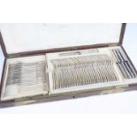 A late 19th century French silver part cutlery suite, comprising 33 table forks, 21 tablespoons, and