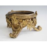 A late 19th century French gilt bronze vase stand, the whole raised on acanthus leaf topped swept