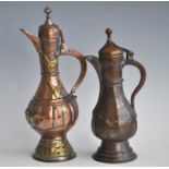 An Islamic copper butter teapot, having a domed cover above a fluted globular body and domed foot