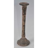 An Egyptian / Roman tall candlestick unguentarium glass vessel, having a flared circular rim to a