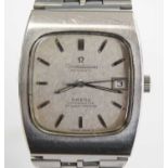 A gent's stainless steel Omega Constellation automatic wristwatch, having a cushion shaped silver