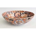 A Japanese Meiji period Fukagawa Imari porcelain bowl, of lobed circular form, decorated to the