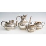 A Victorian silver four-piece tea and coffee service, comprising teapot, coffee pot, twin handled