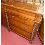 A mid-Victorian Scottish walnut chest of two short over three long drawers, within spiral turned