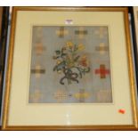 A George III cross-stitch needlework panel depicting bouquet of flowers, signed with monogram AS and