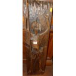 A stained softwood carved wall panel, in the form of Medieval Knight, 90 x 23cm
