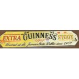 Reproduction cast iron advertising sign for Guinness, width 56cm