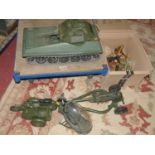 An Action Man tank, helicopter, motorcycle and sidecar, and artillery gun, and a small quantity of