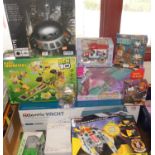 A quantity of various games and toys including Ben 10 Alien Laboratory, a radio controlled luxury