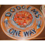 A reproduction painted wooden fairground sign for the Dodgems, dia. 76cm