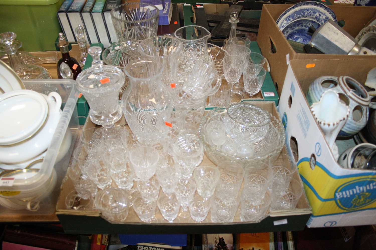 Two boxes of glassware, to include a prism cut crystal candle jar