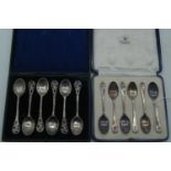 A set of six George VI silver teaspoons, in fitted blue leather case; together with a set of six