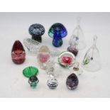 A collection of glassware to include paperweights and bells