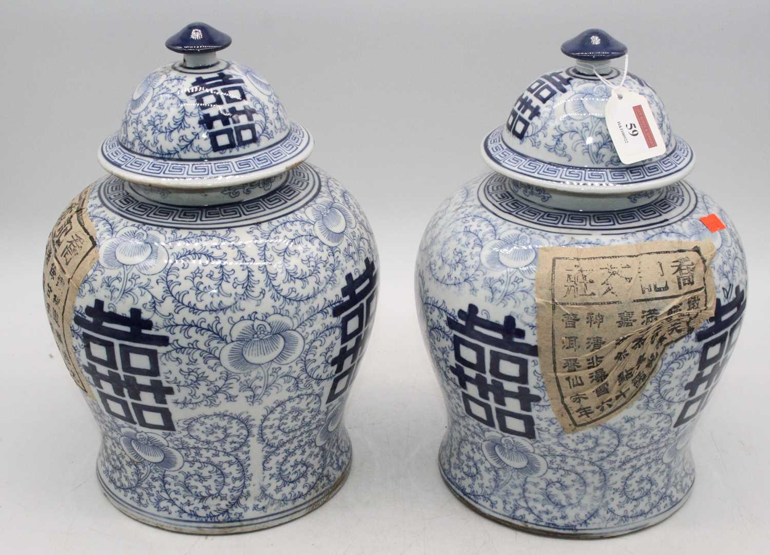 A pair of Chinese blue & white porcelain temple jars, height 32cm each