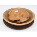 A 19th century mahogany circular tray, dia.33cm; together with two treen bowlsExtra images