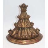 A carved gilt wood wall bracket, height 23cm