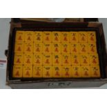 A mah-jong set from the Chun Wah Trading Company of Shanghai, in original box, w.25cm148 tiles;