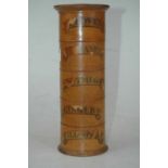 A Victorian turned sycamore five-division spice tower, each section annotated for Cloves,