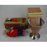 A mid-20th century wind-up model of a bartender, boxed; together with an authentic Morooccan