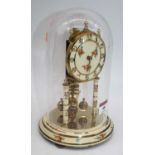 A 20th century floral decorated anniversary clock, housed under a glass dome, h.23cm