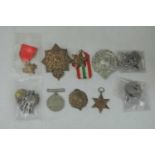 A collection of three WWII medals, being 1939-45 Star, Italy Star, and Defence medal; together