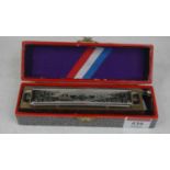 A Hohner The Super Chromonica Chromate-Harmonica, in original box