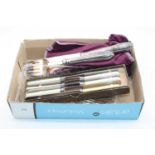 A small collection of loose plated flatware, to include a pair of fish servers, set of six fish