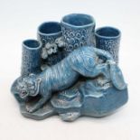 A Chinese blue glazed model of a tiger, h.12cmSee extra images.Slight chips on base.Tiger's back