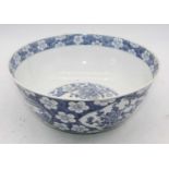 A Chinese blue & White porcelain bowl decorated with flowers, 29cm dia. (a/f)Large hairline crack