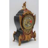 A 19th century French brass inlaid faux tortoiseshell mantel clock, the dial showing Roman enamel