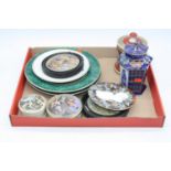 A collection of Victorian Pratt ware to include pot lids, plates, and a jar, together with a