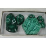 A small collection of carved and polished malachite items, eggs, ashtray etc