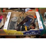 A box of miscellaneous items to include metalware, a charger stand, etc