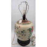 A Chinese export porcelain jar, later converted to a table lamp, enamel decorated with birds amongst