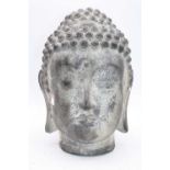 A modern composite model of Buddha's head, h.33cm