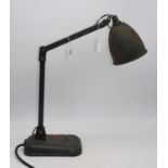 A vintage industrial grey painted adjustable desk lamp