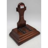 A 19th century mahogany charger stand, h.25cm