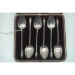 A set of six George V silver teaspoons, each having a plain bowl, spirally turned stem, and