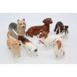 A collection of seven Beswick figures of dogs, to include Dachshund seated No.1460, Jack Russell