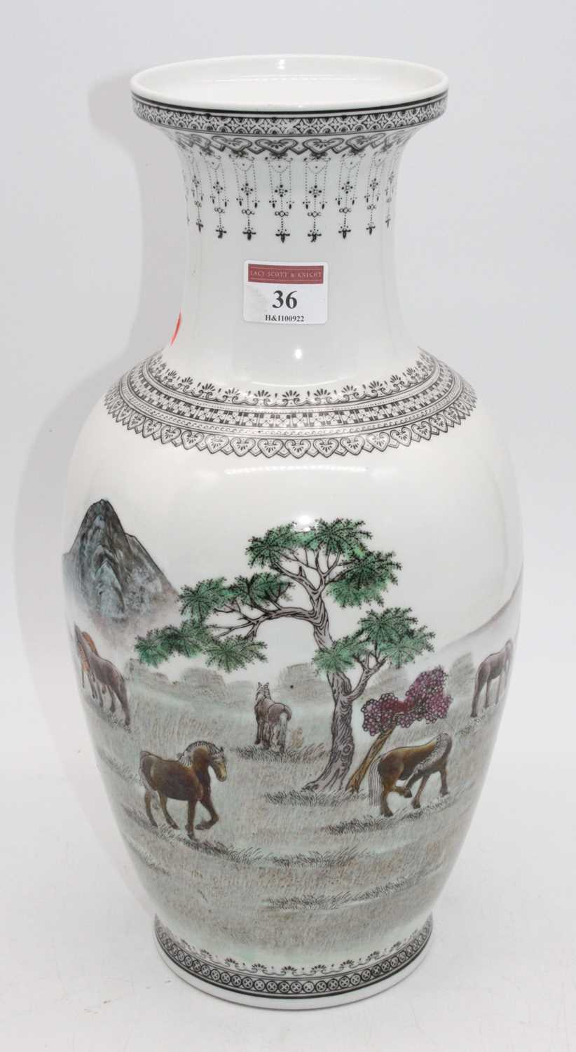 A Chinese porcelain vase, enamel decorated with horses within a landscape, red enamel seal mark to