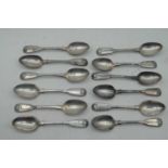 A set of twelve George III silver teaspoons, each having shell cast terminal, gross weight 9.4oz