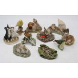 A collection of various figures of animals to include a Beswick model of a Greenfinch, and John