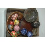 A small collection of polished hardstone and other ornamental eggs, to include onyx and painted