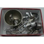 A small collection of miscellaneous items to include loose silver plated flatware, white metal