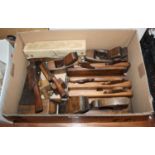 A collection of vintage block and moulding planes